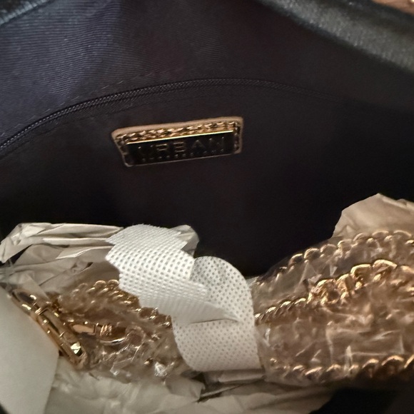 Urban expressions vegan Laisha Brown snake
Print knitted shoulder bag NWT - Picture 15 of 15